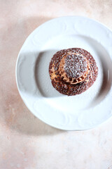 Pastry with custard. French pie Shu with peach jam. Modern dessert. Top view.