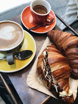 UGC photo of a Cozy Coffee and Croissant in a Quaint Caf&eacute; Setting