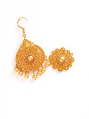 Gold earring with intricate design and elegant finish on white background, white, jewellery, accessory