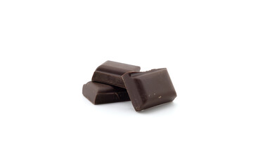 Broken chocolate. Chocolate pieces isolated. Cubes of milk chocolate bar pieces on white background as package design elements. Set of different dark chocolate pieces.