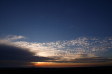 Beautiful , luxury soft gradient orange gold clouds and sunlight on the blue sky perfect for the background