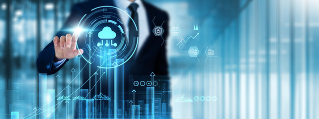Cloud Computing: Businessman touches cloud computing analyzing graph data storage, scalability,...