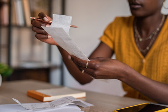 Woman checking receipts 