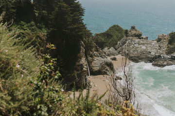 waterfall in big sur in the mountains in northern california