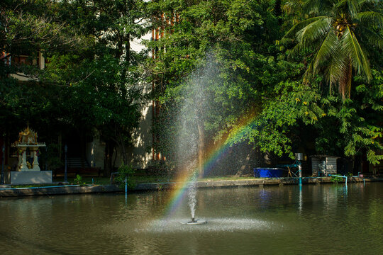 Rainbow over a water fountain