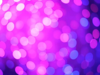 Vibrant pink and blue bokeh lights creating a festive and playful background, bright, cheerful, bokeh