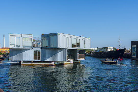 A floating house made of repurposed shipping containers