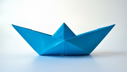 Blue paper boat on white background