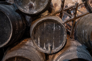 Solera system in old Andalusian wine cellar, process for aging sherry wine in barrels, fino, manzanilla, olorosso, amontillado jerez fortified wine, Sanlucar de Barrameda, Cadiz, Andalusia, Spain