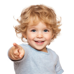 Smiling child with curly blonde hair pointing playfully, isolated on white background, wearing a light blue shirt.