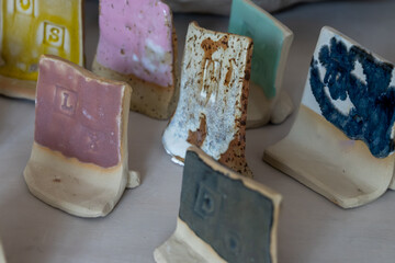 Samples of ceramic art objects and tabelware during workshop in art ceramic atelier in Poland