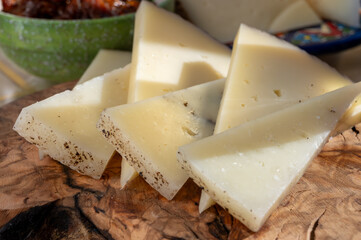 Cheese collection, Spanish matured cheese and onion chutney close up