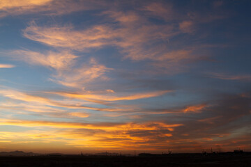 Beautiful , luxury soft gradient orange gold clouds and sunlight on the blue sky perfect for the background