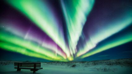 A breathtaking Northern Lights, illuminating the night sky. The aurora expanse of the heavens. Simple wooden bench and a pristine snow-covered landscape.