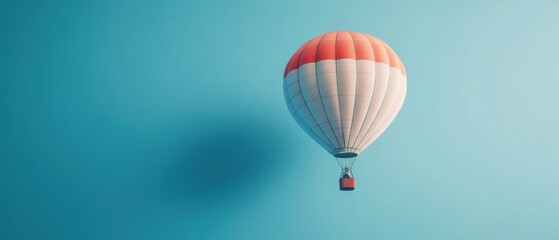 Obraz premium A colorful hot air balloon floating against a blue background.