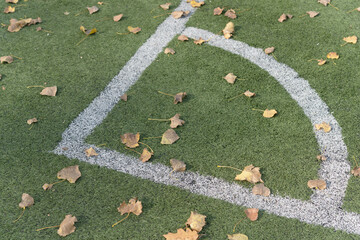 corner arc or corner quarter-circle at an outdoor soccer pitch in autumn