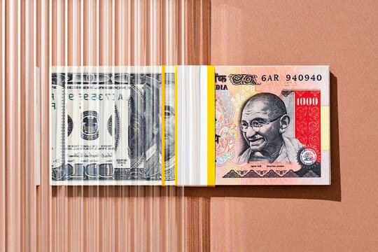 One hundred US dollars to Indian rupee , money. exchange concept