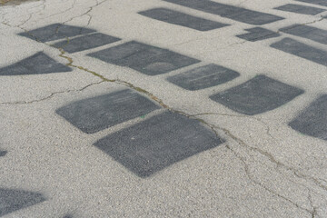 covered over message on old asphalt in the park