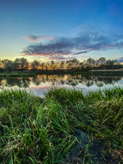 small lake autumn landscape sunny autumn day change colors. Autumn landscape. Beautiful warm colors