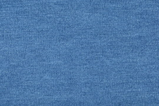 Light Blue Jeans Fabric Background.