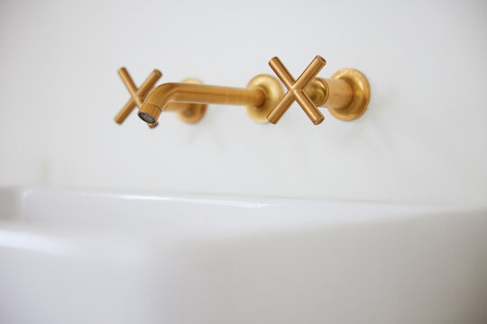 Brass gold hardware faucet fixture bathroom sink
