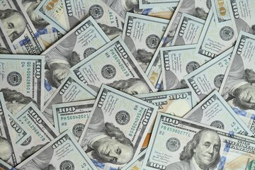 Big amount of american USD hunderd dollar bills banknotes close up