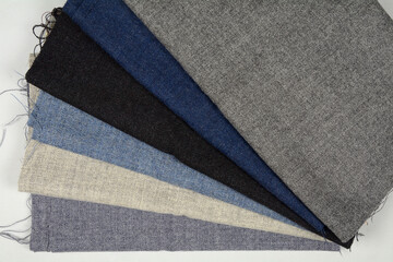 Stack Of Multicolored Fabrics, Tweed Fabrics. 