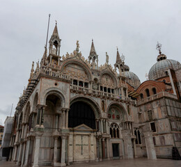 Fototapeta premium A view of the historic St. Marks Basilica, located on Piazza San Marco in the city of Venice in Italy