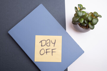 Day off - workplace message in the office. Concept of absence from work and day off