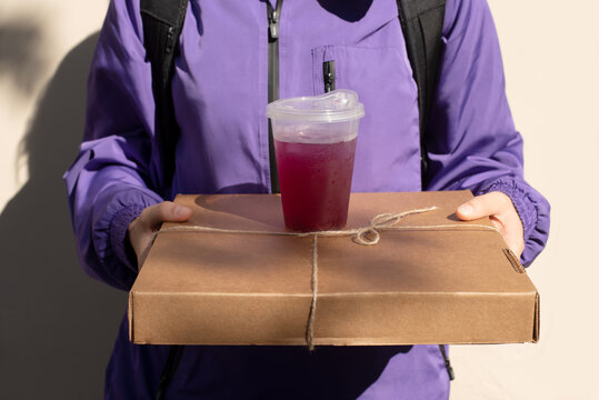 Delivery of food and drink held by a person outside
