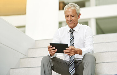 Tablet, reading and mature of business man in office for planning, private equity associate and...