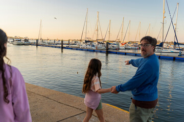  Father and Daughter Spotting Message in Bottle

