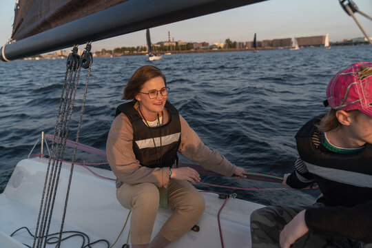 wo People Sailing on a Boat at Sea