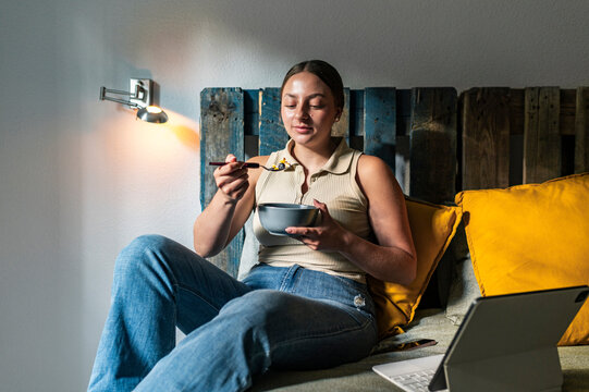 Healthy woman having breakfast 