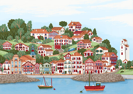 Various houses on hill by sea. Basque architecture in Ciboure, France