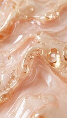 Obraz premium Closeup of a light pink liquid with small air bubbles. The texture is smooth and soft, with a delicate sheen.