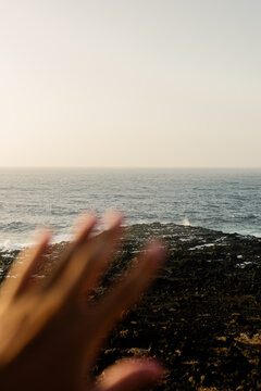 POV of a person reaching forward the shores of Timanfaya National Park