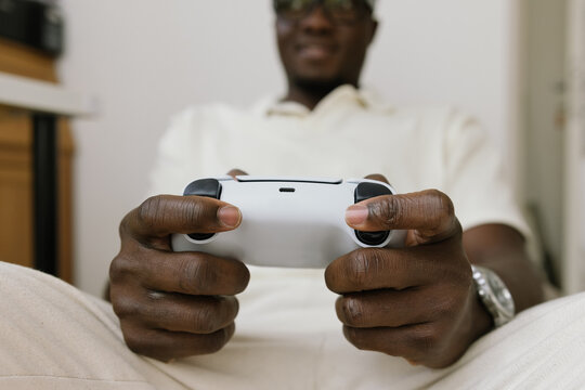 Man playing video games with a joystick
