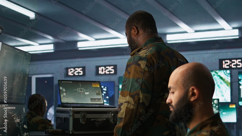 Poster military officer using tracking software to be able to offer info to front lines commander. army exp