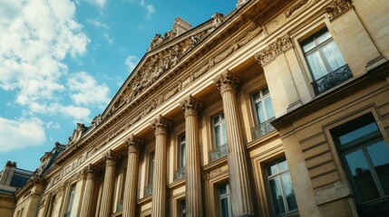 Neoclassical building adorned with columns and elegant moldings, ample sky copy space