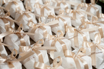 background, well married, sweets, happily married in white boxes on candy table in ballroom, candy in the box, party sweets, candy table