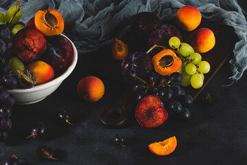 Freshly washed fruits with water droplets. bright high key look conveys freshness. Variety of fresh...