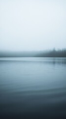 Serene Misty Lake at Dawn