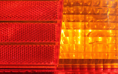 Vehicle rear light close-up abstract textured background