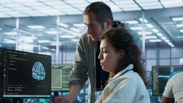 Woman requesting help from senior engineer to fix error in high tech AI data center. Employee in need of aid from IT professional to repair artificial intelligence supercomputers, camera A