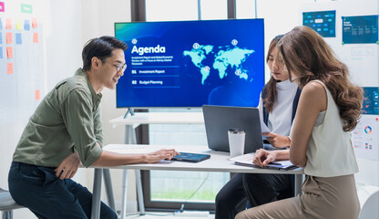 team of financial discussion business planning, analyzing digital financial data and strategy in a modern office