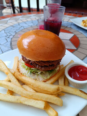 double patty hamburger and fries