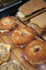 An Appealing Display of Tasty Bagels and Scrumptious Snacks Located in a Cozy Bakery Environment