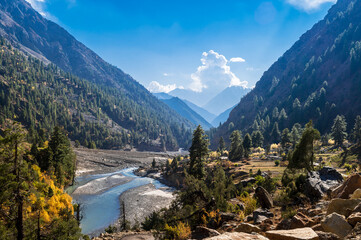 Landscape with river. Miyar Valley is a remote and scenic valley located in the Western Himalayas, Himachal Pradesh, India. It is a part of the Lahaul Range, between Pir Panjal and Zanskar Range.

