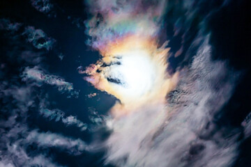 iridescent pileus cloud light reflecting from the sun